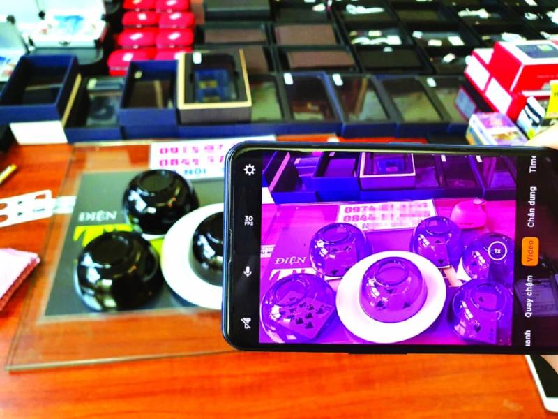 Tài Xỉu Bịp Và Cách Phát Hiện Giúp Bạn Tránh Xa Các Trò Lừa Đảo 3 Nắp tài xỉu gắn camera
